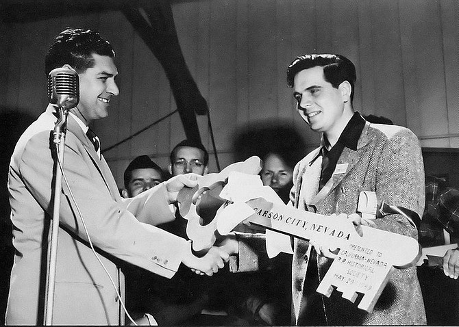 Photo courtesy the Ted Wurm CollectionMayor Caro Pendergraft of Carson City presents a key to Arthur Lloyd, right, president of California-Nevada R.R. Historical Society, operator of the 1949 excursion. Pendergraft died Nov. 6 in Atlanta at the age of 96.