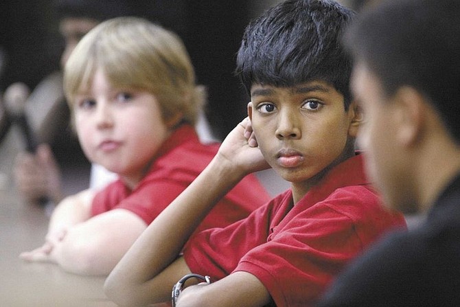 Cathleen Allison/Nevada AppealVisesh Ravikumar, 13, listens to a competitor answer a question in Thursday&#039;s geography bee at Bethlehem Lutheran School. Revikumar won the event for the second year in a row.