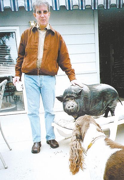 Courtesy PhotoMayor-elect Bob Crowell is seen with his pig, Arnold and dog Harley.