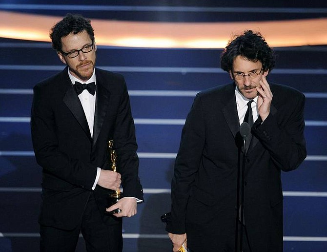 Directors Joel Coen, right, and Ethan Coen accept the Oscar for best director for their work on &quot;No Country for Old Men&quot; at the 80th Academy Awards Sunday, Feb. 24, 2008, in Los Angeles. (AP Photo/Mark J. Terrill)