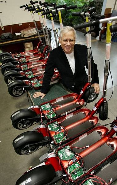 Cathleen Allison/Nevada Appeal Steve Patmont poses on the production line of electric scooters at the Patmont Motor Werks plant in Minden on Jan. 18. The scooter company filed an antitrust lawsuit over Chinese trade practices in an effort to level the playing field for American companies asserting claims of product piracy, impure ingredients and unsafe products.