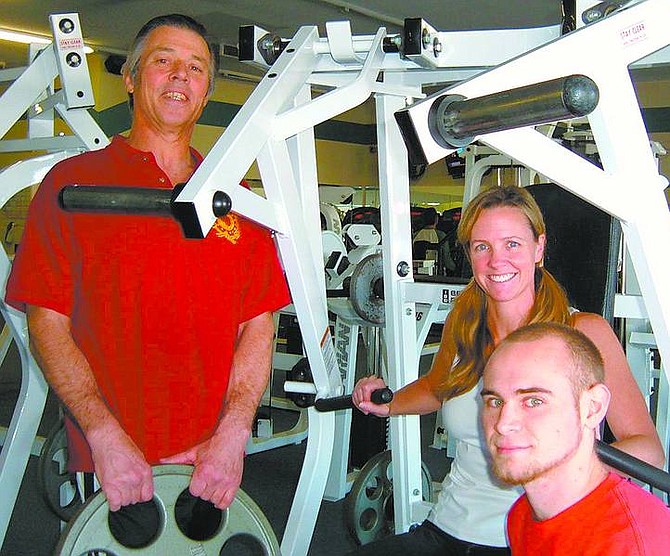 Local martial arts instructor and owner of Universal TaeKwon-Do, John Mariott, left, recently purchased Beyond Fitness where he will now combine the facilities to provide a variety of health and fitness opportunities. Also shown is assistant Judith Keeney, center, and Head TaeKwan-Do instructor, Adam Richards.  Mary Jean Kelso/ Appeal News Service