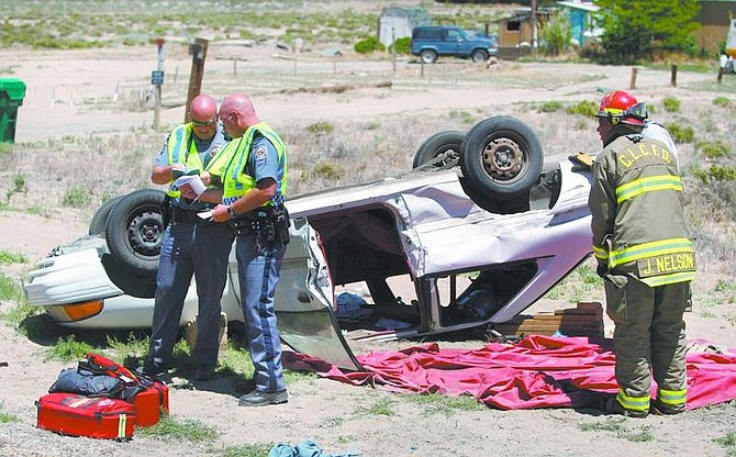 Cathleen Allison/Nevada Appeal Two Silver Springs residents were taken by Care Flight to a Reno hospital following an accident on Highway 95A near Ramsey Weeks Cutoff.