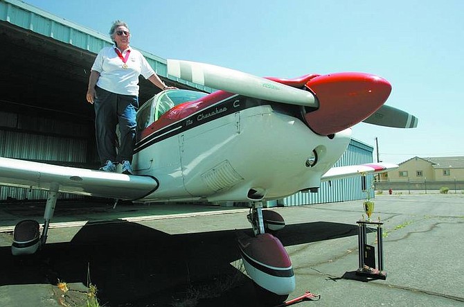 BRAD HORN/Nevada Appeal Dene Chabot-Fence, 75, pictured on her 1966 Piper Cherokee at the Carson Airport, won the Air Race Classic &#039;08, a race from Montana to Massachusetts.