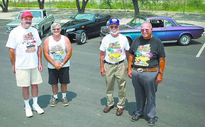 Cathleen Allison/Nevada Appeal Members of the Karson Kruzers, from left, Mike Baugus, Tony Marcin, Gino Ghiselli and Jack Gorden show off some of the classic cars that will be on display this weekend during the 24th annual Run What Cha Brung event. Behind them are Baugus&#039; 1965 Barracuda, Ghiselli&#039;s 1999 Plymouth Prowler and Gorden&#039;s 1963 Chevrolet Corvair Spyder.