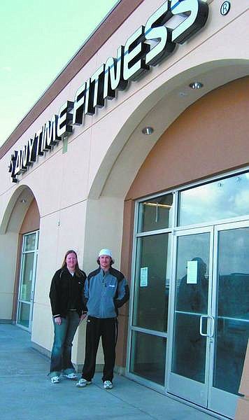Mary Jean Kelso/Nevada Appeal News Service  Anytime Fitness owner Alex Hilgenberg and Shelby Hill, fitness manger and trainer, are preparing to open the new 24-hour co-ed fitness center at 1201 Penny Lane in the Chisholm Shopping Center by mid-February.
