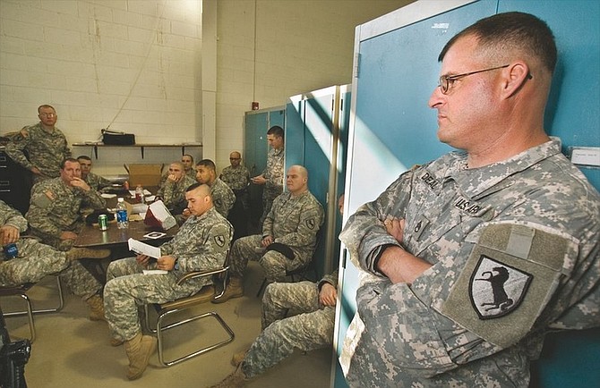 Kim Lamb/Nevada Appeal News ServiceStaff Sgt. John Deal of Carson City, a platoon sergeant with Yerington&#039;s Alpha Troop, 1st Squadron 221st Cavalry, listens to instruction on Friday afternoon. Soldiers from the Nevada Army National Guard&#039;s 221st Cav will deploy to Afghanistan this spring.