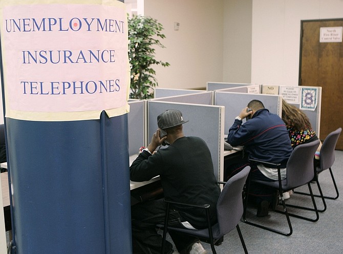 People call an unemployment insurance hotline at the Career Link Center in San Francisco, Friday, March 6, 2009. The government says the nation&#039;s unemployment rate bolted to 8.1 percent in February, the highest since late 1983, as cost-cutting employers slashed 651,000 jobs. (AP Photo/Marcio Jose Sanchez)