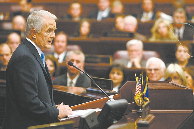 Nevada Gov. Jim Gibbons delivers his State of the State address Thursday night, Jan. 15, 2009 at the Legislature in Carson City, Nev. (AP Photo/Nevada Appeal, Cathleen Allison)