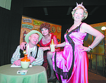 Brad Horn/Nevada AppealThe villainous Sheriff Amos Crutchwaffle, left, played by Mark McGyver, Belle the owner of the saloon, played by Jan Duke, and April the bar maid, played by Sue Volz, rehearse for the Misfits Theater Group&#039;s performance of &quot;Showdown at the Phingerdoo.&quot;