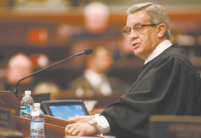 Nevada Supreme Court Chief Justice James Hardesty addresses the Legislature on Tuesday, March 24, 2009, in Carson City, Nev. Hardesty outlined goals for the state judicial system in his speech. (AP Photo/Nevada Appeal, Cathleen Allison)