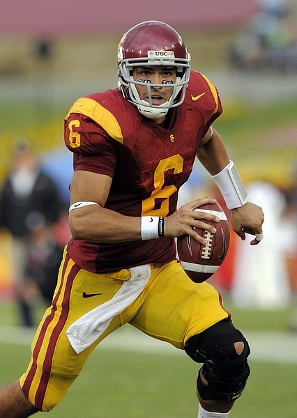 ** FOR USE AS DESIRED WITH NFL DRAFT STORIES ** FILE - In this Nov. 1, 2008 file photo, Southern California quarterback Mark Sanchez runs with the ball during the first half of an NCAA college football game against Washington in Los Angeles. Sanchez is a top prospect in the 2009 NFL Draft. (AP Photo/Mark J. Terrill, File)