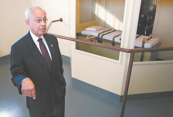 Nevada Department of Corrections Director Howard Skolnik is seen in this Oct. 2007 file photo from the execution chamber at the Nevada State Prison. During a budget hearing  Thursday, April 23, 2009, Skolnik told state lawmakers that the existing execution chamber is &quot;almost medieval.&quot; (AP Photo/Nevada Appeal, Cathleen Allison)