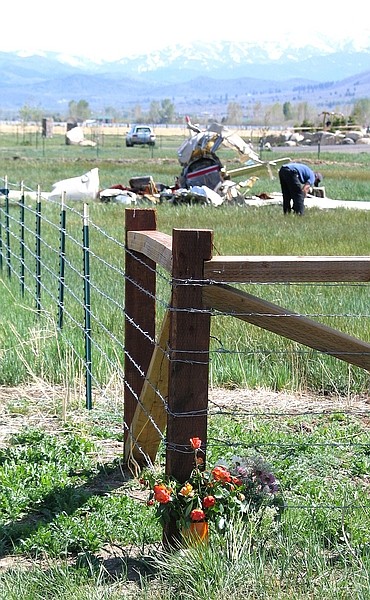 Kurt HildebrandFlowers were left at the scene of a fatal airplane crash near Mottsville Lane.