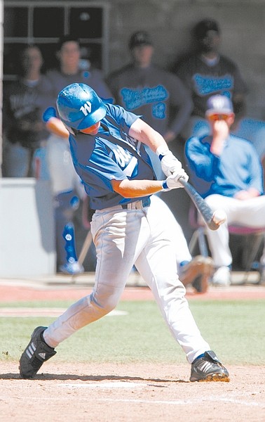 Brad Horn/Nevada AppealWNC third baseman Travis Feiner hits with a wood bat during the Region XVIII tournament. The Wildcats will play with aluminum bats for the remainder of their postseason.