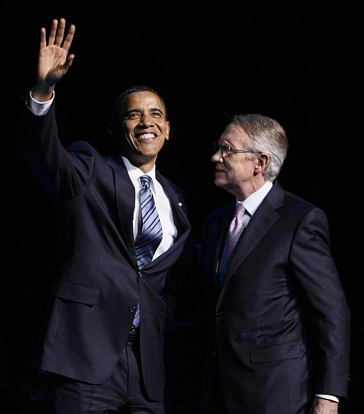 President Barack Obama stands with Senate Majority Leader Harry Reid, D-Nev., at a fundraising event at Caesar&#039;s Palace in Las Vegas, Nev., Tuesday, May 26, 2009. (AP Photo/Charles Dharapak)