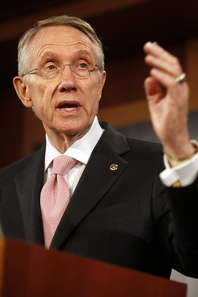 FILE - In this April 28, 2009 file photo, Senate Majority Leader Harry Reid gestures during a news conference on Capitol Hill in Washington. Reid will take the stage with President Barack Obama on Tuesday at a Las Vegas-style fundraiser billed as &quot;The Good Fight.&quot; But the big-dollar bash is begging the question: Where&#039;s the fight?  (AP Photo/Jacquelyn Martin, FILE)