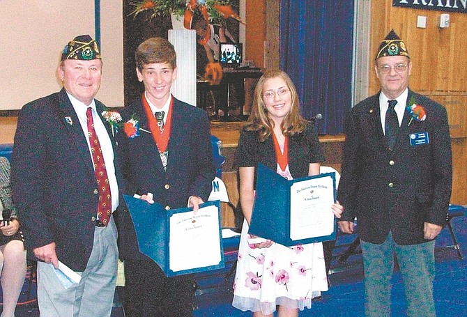 Capitol Post No. 4 of Carson City presented its annual American Legion School Awards to Eagle Valley Middle School students Avery Hudak and Benjamin Osheroff. Both students were chosen by the faculty to receive the award in recognition of the possession of those high qualities of courage, honor, leadership, patriotism, scholarship and service which are necessary to the preservation and protection of the fundamental institutions of our government and the advancement of our society. The awards were presented by the commander of the post, John Warden and the post vice commander, Daryl Haines.