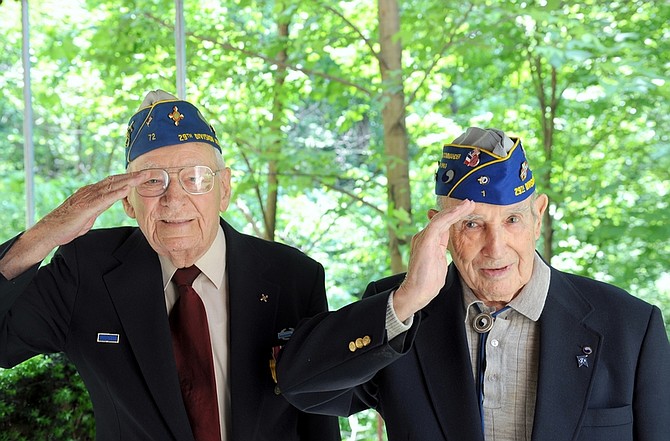 Saturday will probably be the last time World War II veterans William Doyle, 94, and Sam Krauss, 92, both members of the famed 29th Infantry Division, are able to visit the Normandy coast where 65 years ago they landed as soldiers unsure they&#039;d survive. The two men, who met about 25 years ago at a veterans reunion, live in a retirement community in Catonsville, Md., down the hall from each other.  Illustrates DDAY (category a), by Christian Davenport (c) 2009, The Washington Post. Moved Friday, June 5, 2009. (MUST CREDIT: Washington Post photo by Katherine Frey)