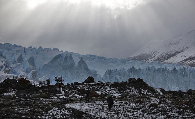 **ADVANCE FOR MONDAY, JUNE 15**  FILE - In this May 18, 2009 file photo, tourists walk in front of Perito Moreno Glacier in Los Glaciares National Park in Argentina&#039;s Patagonia region. (AP Photo/Natacha Pisarenko, File)