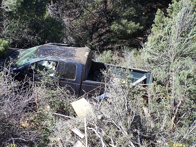 Donald Hill&#039;s truck after it rolled 100-feet down a steep embankment on Geiger Grade this morning. Hill sustained minor injuries.