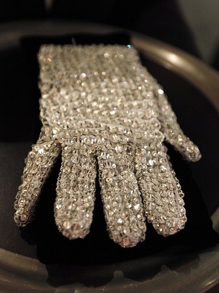 FILE - In this April 13, 2009 file photo, Michael Jackson&#039;s white crystal glove is seen on display at the Julien&#039;s Auctions Michael Jackson exhibit in Beverly Hills, Calif. Items owned by Jackson was auctioned April 22. Jackson, 50, died at UCLA Medical Center in Los Angeles, Thursday, June 25, 2009. (AP Photo/Matt Sayles, File)