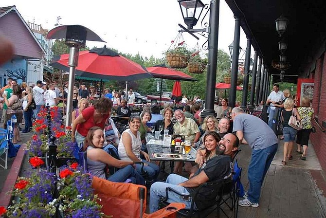 The crowd kicks back at last week&#039;s Fridays @ 3rd gathering in downtown Carson City.