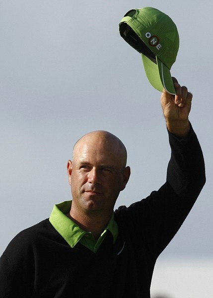 Stewart Cink of the US walks down the 18th fairway during the final round of the British Open Golf championship, at the Turnberry golf course, Scotland, Sunday, July 19, 2009. (AP Photo/Peter Morrison)