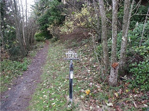 In this 2007 photo provided by Jon Knechtel, the original Pacific Northwest Trail sign is seen on Samish Overlook  near Burlington, Wash.  Efforts to create a Pacific Northwest National Scenic Trail began in 1970 and finally achieved success when President Obama in March signed a bill creating the first new national scenic trails in 26 years. (AP Photo/Jon Knechtel)**MAGS OUT; NO SALES **