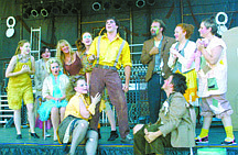 Sally J. Taylor/Nevada AppealDakota Dutcher, center, as Bobby Strong, sings about freedom, in a scene from &quot;Urinetown: The Musical&quot; on Tuesday at the Brewery Arts Center&#039;s Outdoor Amphitheatre. The production of BAC&#039;s Summer Stock Theatre Company opens tonight.