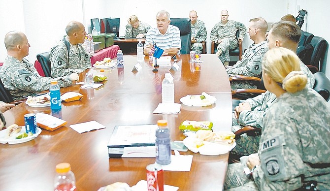 Courtesy Spc. Tyler Maulding/U.S. Army Gov. Jim Gibbons addresses troops from Nevada during a town hall meeting at Multi-National Division - South headquarters on Sunday. Gibbons came to Contingency Operating Base Basra, Iraq as part of a three-governor tour.