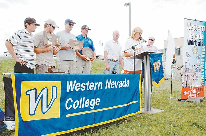 Western&#039;s baseball team and coaches are congratulated at an awards barbecue in June, after taking third place in the Junior College World Series. The Wildcats were the only team competing that also had academic honors for a team GPA of &quot;B&quot; or better.