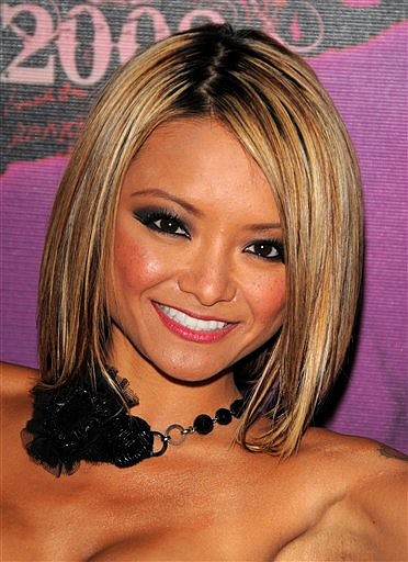 FILE - In this Dec. 31, 2007 file photo, TV Personality Tila Tequila makes an appearance at MTV Studios in New York.  Authorities say San Diego Chargers star linebacker Shawne Merriman has been arrested on suspicion of choking and restraining his girlfriend, a reality TV star, as she tried to leave his Southern California home.  San Diego County Sheriff&#039;s Lt. Gary Steadman says 27-year-old Tila Tequila signed a citizen&#039;s arrest warrant early Sunday, Sept. 6, 2009, charging Merriman with battery and false imprisonment.  (AP Photo/Peter Kramer)