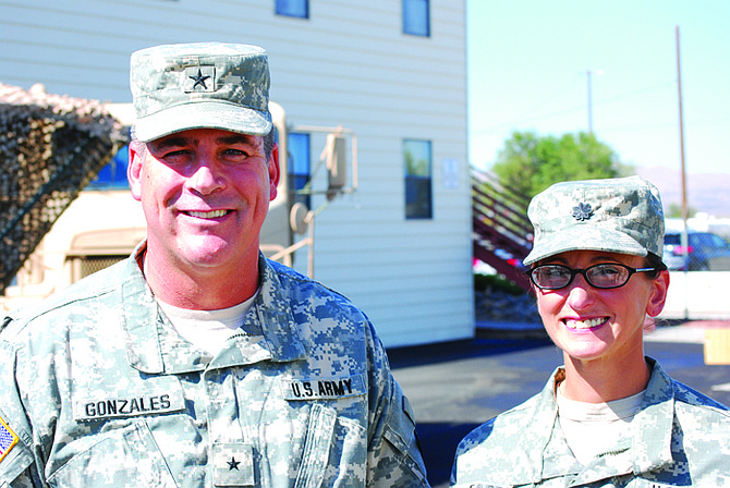 Steve Ranson/ Nevada Appeal News ServiceBrig. Gen. Frank Gonzales, commander of the Army Guard, poses with Lt. Col. Joanne T. Farris, who assumed command Sunday of 1st Battalion, 421st Regiment (Regimental Training Institute).