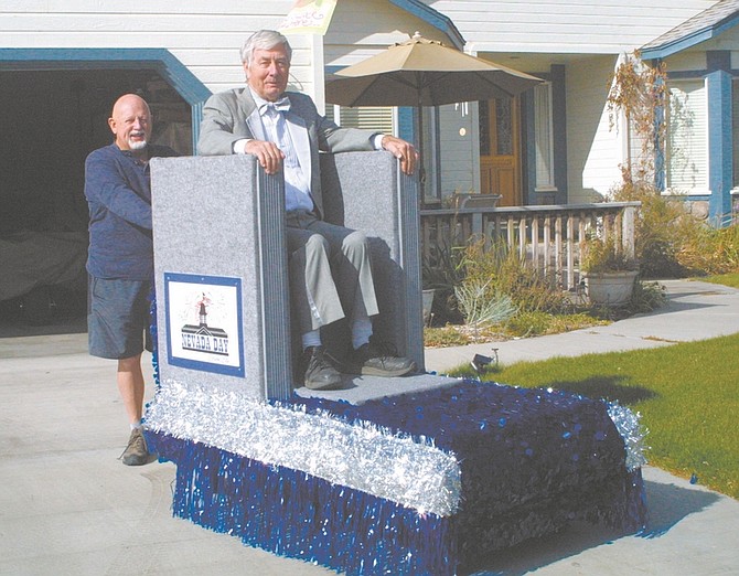 Sandi Hoover/Nevada AppealNevada Day Chairman Reg Creasey, left, shows off the latest trend in hometown parades - a push cart float which the Nevada Day Committee is entering this year.