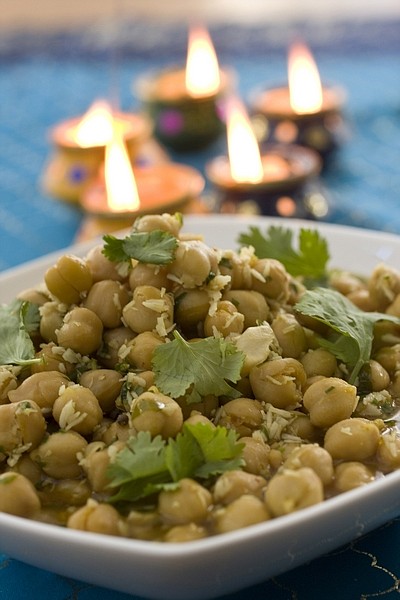 This photo taken Sept. 20, 2009 shows Chickpeas in Coconut Sauce. Freshly ground blends of pan-roasted chilies and coriander seeds provide a burst of flavor in this Chickpeas in Coconut Sauce an curry that can be served during Diwali, the Hindu celebration of lights. (AP Photo/Larry Crowe)