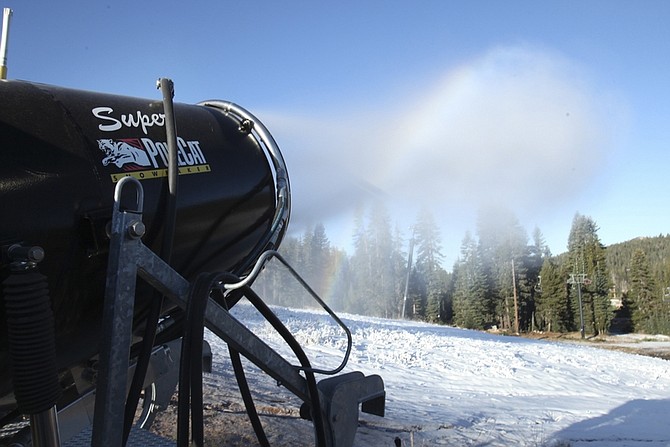 A snow making machine sprays out man-made snow at Boreal Mountain Resort at Donner Summitt, Calif., Thursday, Oct. 1, 2009.  With recent overnight temperatures in the Sierra Nevada dropping below 28 degrees Boreal  began making snow Tuesday night, the earliest start ever, for the resort to begin snow making operations.  Using water saved in a pond from last year&#039;s snow pack, they work at night and stop when the temperatures warm during the day.  If the weather continues to stay cold, Boreal is looking to open for skiing between mid-to-late October. (AP Photo/Rich Pedroncelli)