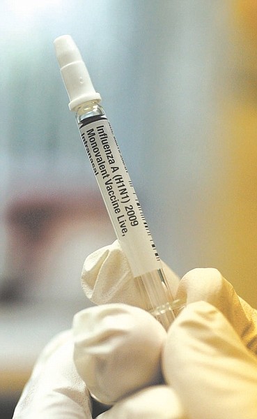 A dose of the swine flu vaccine mist, also known as the H1N1 vaccine, is shown at the Flagler County Health Department in Bunnell, Fla., Thursday, Oct. 8, 2009. Health workers are at the top of the list of those being encouraged to get inoculated. (AP Photo/Daytona Beach News-Journal, David Massey)