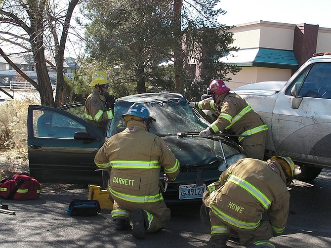 Rescuers cut a Carson City man from the wreckage of a Dodge Intrepid following an 11:32 a.m. accident there.