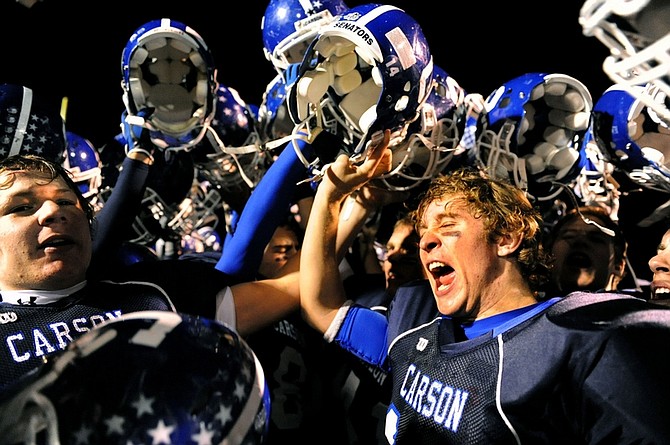 Photo by Lisa J. Tolda/Lisajphotos@gmail.com ... Carson&#039;s Logan Peternell, left, and Levi Bloxton, right, celebrate their win against North Valleys during the first round of the 2009 NIAA 4A northern region football playoff.