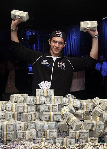 Joe Cada poses for photos after winning the 2009 World Series of Poker at the Rio Hotel &amp; Casino Tuesday, Nov. 10, 2009 in Las Vegas. Cada defeated Darvin Moon to win $8.5 million. (AP Photo/Isaac Brekken)