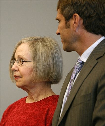 FILE - In this Oct. 16, 2009 file photo, Wanda Eileen Barzee, left, stands with her attorney, Scott Williams, for her competency review at the Matheson Courthouse in Salt Lake City. On Tuesday Nov. 17, 2009, Barzee, one of two people charged in the Elizabeth Smart case, will plead guilty to charges of kidnapping and unlawful transportation of a minor in U.S. District Court in Salt Lake City, her attorney Williams told The Associated Press. (AP Photo/Rick Egan, Pool, File)