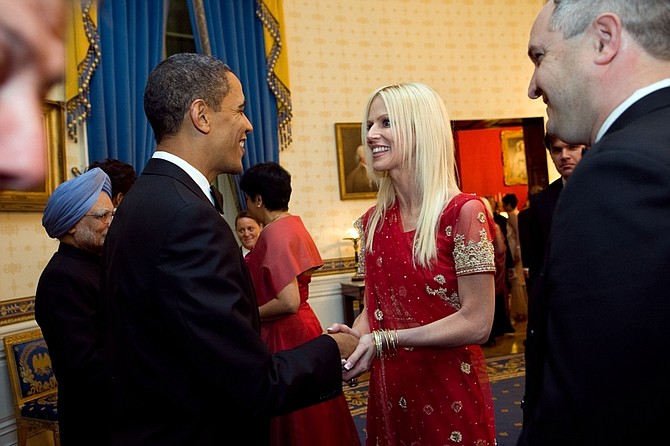 This photo released by the White House Nov. 27, 2009, shows President Barack Obama greeting  Michaele and Tareq Salahi, right, at a State Dinner hosted by Obama for Indian Prime Minister Manmohan Singh at the White House in Washington Tuesday, Nov. 24, 2009.  The Secret Service is looking into its own security procedures after determining that the uninvited Virginia couple managed to slip into the dinner. (AP Photo/The White House, Samantha Appleton)