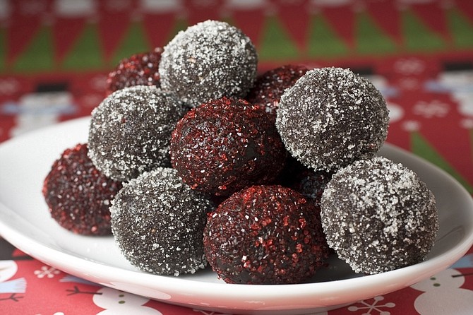 This photo taken Oct. 19, 2009 shows rum balls.  No-bake cookies, like these holiday classic rum balls, let you bypass the cooling time needed for baked and get right to the eating. (AP Photo/Larry Crowe)