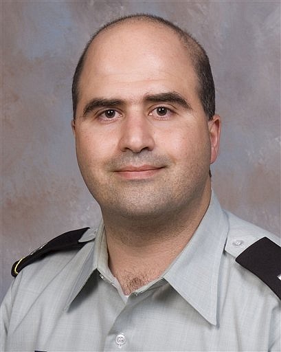 FILE - The 2007 picture provided by the Uniformed Services University of the Health Sciences shows Nidal Hasan when he entered the program for his Disaster and Military Psychiatry Fellowship. An attorney for the Army psychiatrist charged with killing 13 people at Fort Hood says the Army is ordering a mental evaluation for his client. Attorney John Galligan says he received notice Tuesday, Dec. 1, 2009 that the Army wants to perform the exam on Hasan. (AP Photo/Uniformed Services University of the Health Sciences)