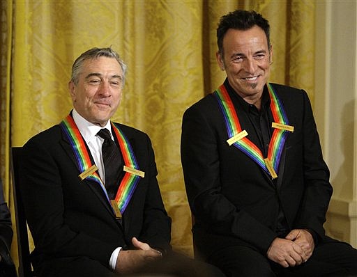 Kennedy Center honorees Bruce Springsteen, right, Robert De Niro sit in the East Room of the White House in Washington Sunday, Dec. 6, 2009. (AP Photo/Alex Brandon)