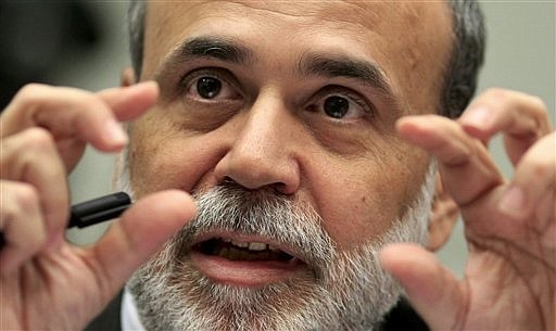 FILE -- In this July 21, 2009 file photo, Federal Reserve Chairman Ben Bernanke delivers a report on the country&#039;s economic and financial health before the House Financial Services Committee, on Capitol Hill in Washington.  (AP Photo/J. Scott Applewhite)