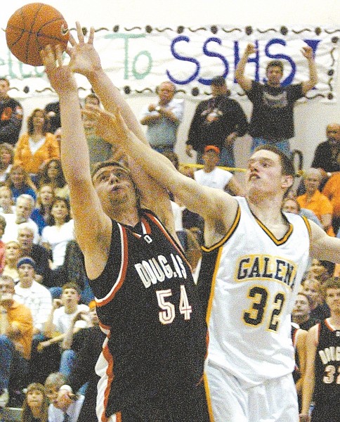 Shannon Litz/Nevada Appeal News ServiceDouglas&#039; Keith Olson battles for a rebound with Galena&#039;s Luke Babbitt in 2007. Olson and Babbitt are now teammates for the Nevada Wolf Pack