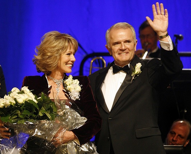 FILE - In this  Jan. 26, 2007 file photo, newly-elected Nevada Gov. Jim Gibbons, right, and his wife Dawn are introduced at the Nevada Inaugural Ball at the Venetian Hotel and Casino in Las Vegas. In a normal year, Gov. Jim Gibbons would have time to spend the final week of 2009 plotting out his re-election run, looking to boost his dismal approval numbers and dealing with a gigantic budget deficit. Gibbons will instead be in a Reno courtroom for a divorce trial opposite first lady Dawn Gibbons _ the woman he evicted from the governor&#039;s mansion. (AP Photo/Isaac Brekken, File)
