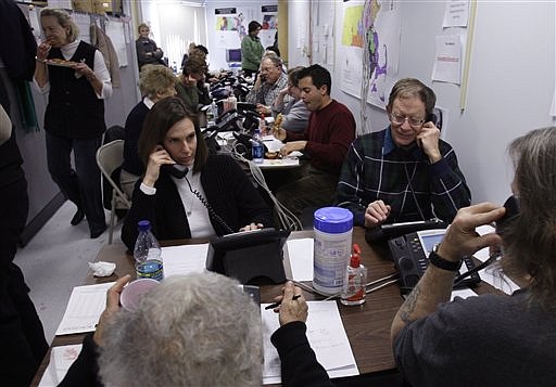 Volunteers call voters during a get out the vote and fundraising effort at the campaign headquarters for Republican U.S. Senate candidate Scott Brown in Needham, Mass., Tuesday, Jan. 12, 2010.  Brown&#039;s campaign pulled in $1.3 million in a 24-hour online blitz buoyed by national interest from Republicans looking for a decisive vote against President Obama&#039;s health care overhaul.  Brown faces Democrat Martha Coakley in next week&#039;s election to fill the seat vacated by the death of U.S. Sen. Edward Kennedy, D-Mass.(AP Photo/Charles Krupa)